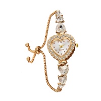 Montre-bracelet pour femme en alliage de quartz, exquise et mignonne, en forme de cœur, écologique, tendance, décontractée, luxueuse, avec aiguilles incrustées de diamants