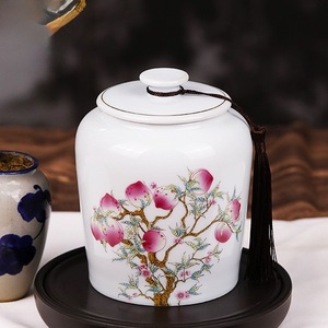 Tarro de cerámica Pu Yu redondo hermético con diseño de nueve melocotones para almacenar té verde, negro y Pu'er. - Product Image 3