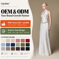 Ensemble deux pièces sur mesure OEM ODM pour femme, tenue de soirée en satin ivoire, débardeur à col halter et jupe longue maxi sans manches, vente en gros
