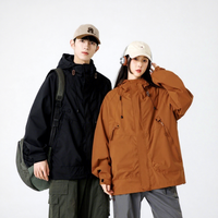 Blouson Bomber Unisexe Imperméable Coupe-Vent en Softshell à Coupe Ample avec Fermeture Éclair et Capuche, Doublure Polaire en Polyester, Effet Délavé pour l'Automne