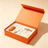 Flip magnétique personnalisé  Coffret cadeau cosmétique haut de gamme en carton rigide orange avec pré-remplissage  Insert en mousse EVA découpé sur mesure pour emballage de kit de soins de la peau OEM ODM