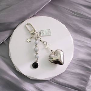 High Quality Fashionable Trend Metal Silver Ins <b>Sweet</b> <b>Bag</b> Key Chain Pendant for Car Key and <b>Bag</b> - Product Image 1