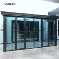 Véranda moderne en aluminium noir, maison en verre sur mesure pour mur extérieur, cour et balcon