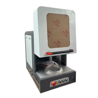 Machine de gravure laser UV 5W avec design de table et boîtier pour le marquage du bois, du contreplaqué, du MDF, du caoutchouc et du métal (refroidissement par eau)