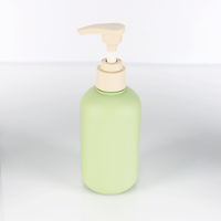 100ml 200ml 300ml 500ml ensembles de bouteilles de lotion PE-HD en plastique vert bouteille de lotion de douche d'émulsion de presse de shampooing vide personnalisée