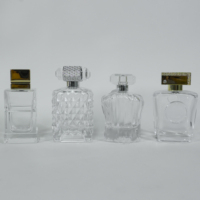 Flacon de parfum en verre transparent personnalisé de 50 ml, flacon de parfum cylindrique à fond épais, flacon de parfum vide en verre avec bouchon