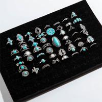 Bagues unisexes populaires en alliage électroplaqué avec fleurs et turquoises, idéales pour le quotidien, les mariages et les fêtes, fabriquées en Chine pour hommes et femmes