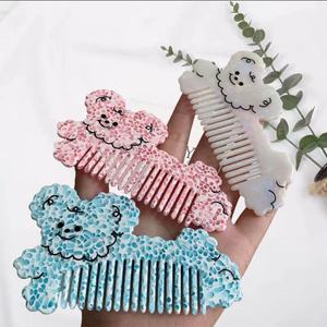 Peigne à cheveux en forme de chien de dessin animé mignon accessoire de cheveux élégant simple et ludique pour filles en acétate - Product Image 2