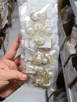 Pendientes de perlas de imitación con lazo de temperamento para mujer, nicho redondo de moda y versátil y pendientes personalizados al por mayor