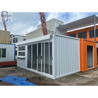 Maison-conteneur moderne préfabriquée à deux étages Mur de verre pour les vacances en bord de mer et en montagne Centre commercial extérieur Salon Bureau à domicile