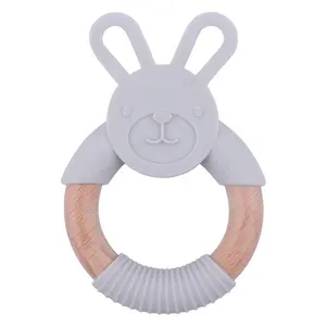 Anneau de dentition pour bébé en bois de silicone personnalisé sans BPA Design animal en bois de hêtre avec bracelet lapin de dessin animé Fonction jouet