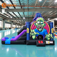 Château gonflable Ceyu avec figurine de zombie verte et toboggan bleu pour location de fête d'Halloween