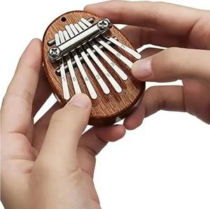 Mini Kalimba en bois à 8 touches, piano à doigts exquis de haute qualité, marimba, bon accessoire musical, pendentif, cadeau - Product Image 1