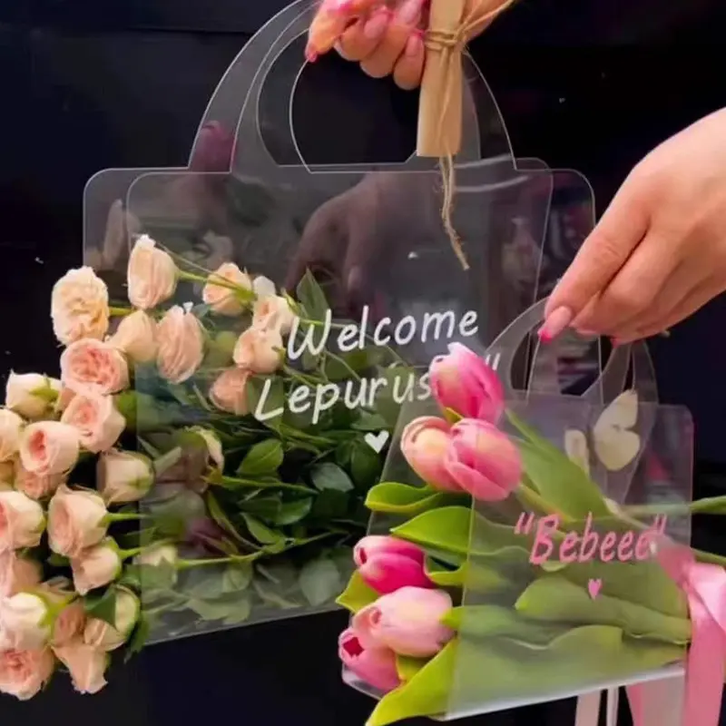 Tiktok vendita calda ricicla Eco Friendly formato personalizzato trasparente sacchetto di fiori in Pvc trasparente sacchetto di plastica fiore con manico