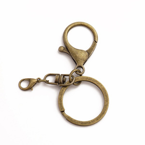 Juego de 4 llaveros metálicos personalizados con mosquetón redondo de aleación de zinc y latón, cubierta resistente para llaves, adorno para coche o bolso - Product Image 4
