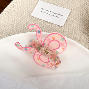 Ventes chaudes : Accessoires pour cheveux en plastique mignons et doux, pinces à cheveux en forme de nœud de couleur bonbon pour les occasions festives - Product Image 5