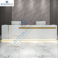Vente en gros logo personnalisé taille pas cher prix d'usine meubles luxe argent beauté vente en forme de L table de réception bureau à vendre