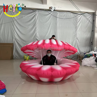 Chaise géante gonflable en forme de coquille de sirène pour la promotion des parcs d'attractions, la décoration d'événements et l'affichage de décors