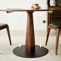 Table à manger moderne en noyer noir massif, design rond peu encombrant pour les petits espaces résidentiels et l'hôtellerie