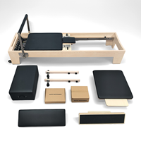 Reformer de Pilates en bois d'érable avec logo personnalisé, capacité de charge de 200 kg, lit d'entraînement pour le renforcement musculaire, équipement de yoga et de fitness pour studio