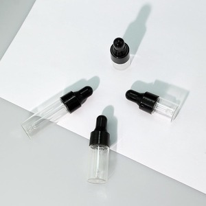 Botellas de Vidrio con Gotero y Tapa de Plástico Negra, Envases de Vidrio Transparente para Aceites Esenciales, Etiquetas Privadas, Precio al por Mayor - Product Image 1