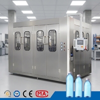 Machine de remplissage d'eau pure rotative monobloc avec rinçage, remplissage et bouchage pour la production de bouteilles d'eau minérale PET de 200 ml à 1500 ml