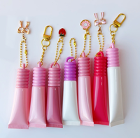 Tubes de gloss à lèvres en PETG avec logo personnalisé, vente en gros, contenants cosmétiques vides à tête ronde, tubes d'emballage pour gloss à lèvres