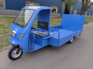 Véhicule électrique à trois roues en promotion : <span class=keywords><strong>Tricycle</strong></span> cargo avec cabine conducteur et capacité de charge de 600 kg - Product Image 1