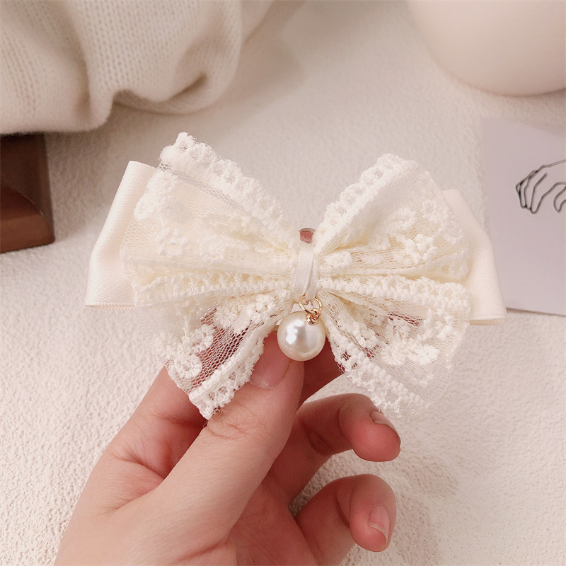 Noeud en dentelle blanc 1-25a089