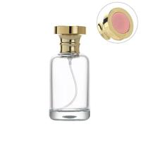 Vente en gros de flacons de parfum en verre transparents cylindriques de luxe de 30 ml, 50 ml, 100 ml avec bouchon à vis, classiques, étanches, écologiques, emballage en boîte