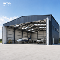 Hangar d'avion en structure acier entièrement conçu Q355, grande portée, entrepôt de stockage d'avions préfabriqué et installé