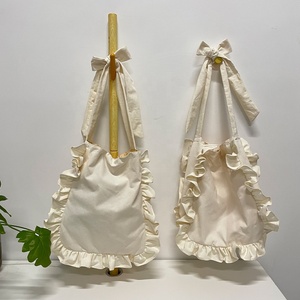 <span class=keywords><strong>Sac</strong></span> fourre-tout personnalisé à volants, <span class=keywords><strong>sac</strong></span> <span class=keywords><strong>de</strong></span> <span class=keywords><strong>plage</strong></span> d'été, sacs à bandoulière style français à volants, sacs <span class=keywords><strong>de</strong></span> shopping en coton doux et souples avec nœud papillon, OEM - Product Image 6