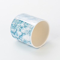 Pot à bougie en céramique élégant à motif de marbre bleu