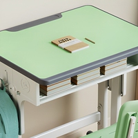 Bureau d'école pour enfants avec chaise, vert clair, bordure blanche, rangement ouvert et hauteur réglable pour une utilisation en classe