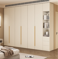 Placard de plain-pied pour chambre à coucher moderne personnalisé Systèmes de garde-robe équipée Caractéristiques de stockage Panneaux de bois Meubles de garde-robe de plain-pied Conception