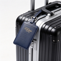 Étiquette de bagage en cuir PU bleu foncé avec rabat gravé au laser pour visites de parcs à thème, support de nom pour bagages, stock mixte