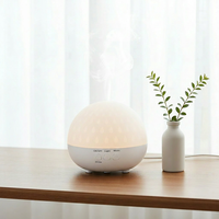 Diffuseur d'huiles essentielles au design moderne, humidificateur d'air en forme de goutte de pluie, diffuseur d'arômes pour la maison, le bureau et l'hôtel