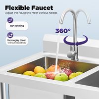 Évier de cuisine commercial autoportant à double bac en acier inoxydable avec robinet rotatif à 360 degrés pour usage en garage