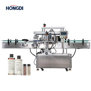 Machine d'étiquetage automatique double face pour bouteilles plates et rondes - Product Image 1