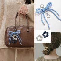 Porte-clés élégant en forme de nœud papillon à double couche en forme d'étoile bleue, design de corde, breloques de sac personnalisables à la mode pour femmes