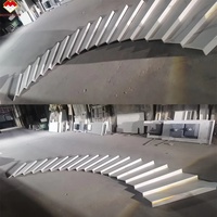 Calacata en pierre artificielle en spirale, marches à rainure antidérapante, escaliers en pierre frittée avec couvercle d'éclairage Led