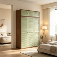 Armoire en acier spacieuse à trois compartiments avec portes à persiennes vert sauge mat et étagères espacées uniformément