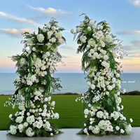Arche de fleurs artificielles vertes tropicales pour mariage, avec support et fleurs au sol, en blanc et vert