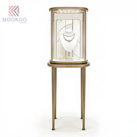 Vitrine de luxe pour bijoux avec éclairage LED, cadre doré sur mesure, verre trempé, qualité commerciale pour la vente au détail haut de gamme