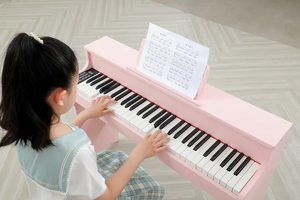 Clavier MIDI USB 61 touches avec fonction de velocity, piano électronique avec 128 sons différents et 80 morceaux de démonstration. Couleur : Rose. Comprend un tabouret. - Product Image 5