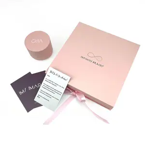 Luxury Custom Pink Packaging Gift Boxes With Ribbon And Partitioned Separately Insert