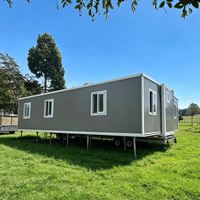 Villa préfabriquée extensible à double aile de 40 pieds Zhonghao, design moderne, panneaux sandwich en acier, maison conteneur respirante, garantie 5 ans