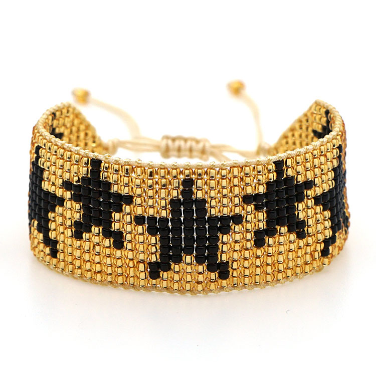 Gold with 7 black star
