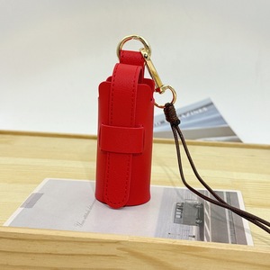 Porte-clés en PVC en forme de rouge à lèvres, pendentif populaire, ensemble d'accessoires pour sacs à main pour femmes, mini sac de rangement haut de gamme, étanche, avec sangle réglable - Product Image 3