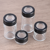 Vente en gros de pots en verre magnifiants noirs UV de 3,5 g et 7 g, pots à fleurs avec couvercle magnifique résistant aux enfants et hermétique